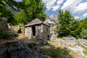 Fototapeta na wymiar Old mill in the Valbona valley in the Dinaric Alps in Albania