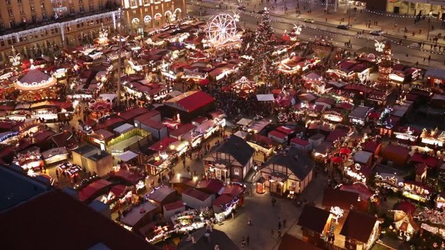 Christmas market in Dresden, Germany, Europe. Illuminated festive ornaments. Winter holidays background during Advent in December.