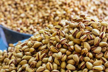 Heap of delicious fresh pistachios in the eastern bazaar.