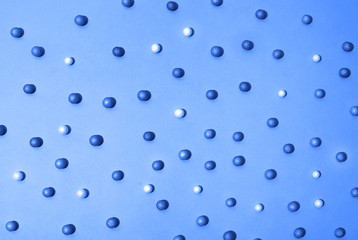 Blue background with balls. Abstract image for your design. Holiday photo. Pattern with balls.