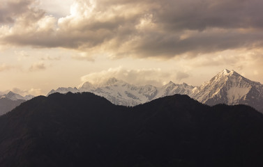 The Himalayan mountains of the Shrikhand Mahadev range seen from the village of Sarahan in Himachal...