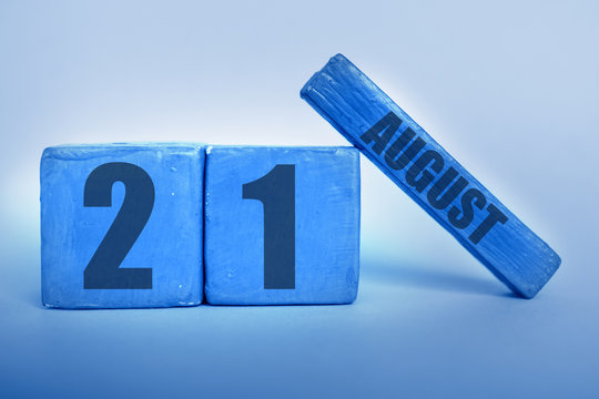 august 21st. Day 20 of month, Handmade wood cube calendar with date month and day in trendy classic blue color of the year summer month, day of the year concept