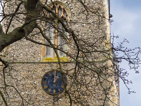 Saxon tower / belltower of ancient All Saints Church, Weybourne, Norfolk, England, UK