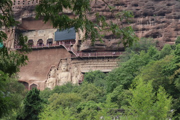 Fototapeta na wymiar Maijishan Cave-Temple Complex in Tianshui , Gansu Province , China. Artistic treasures of Maiji Mountain caves. UNESCO World Heritage Site.