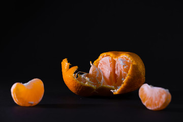 tangerine on a black background