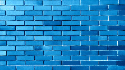 Blue background from brick wall texture pattern, wallpaper design template.