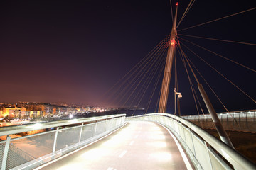 Fototapeta na wymiar Ponte del Mare by Night in the City Illuminated by Lamps