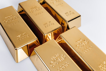 Gold bars of 1 kg or 1000 grams. Gold bars are on the table.