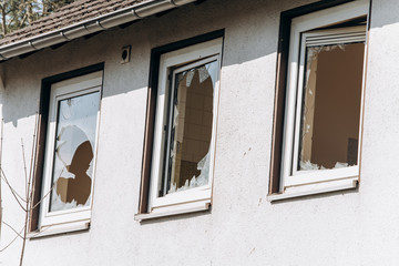 Broken Windows in the house. Shards of glass remained in the window.