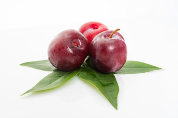 fresh plum isolated on white background