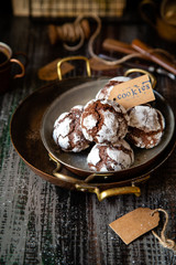 chocolate christmas crinkle cookies in copper plates