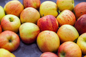 Seasonal fruits are placed in boxes in the grocery store.