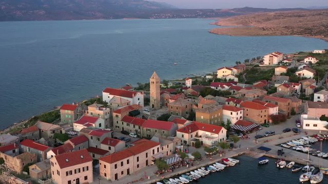 Tranquil Vinjerac, Croatia, retreating aerial from Catholic church