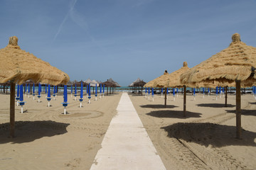 Umbrellas on the Sea by Morning at Season Start