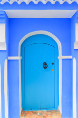 Traditional blue door in the old Medina of Chefchaouen