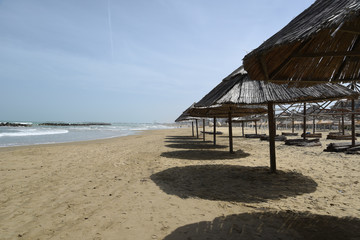 Umbrellas on the Sea by Morning at Season Start
