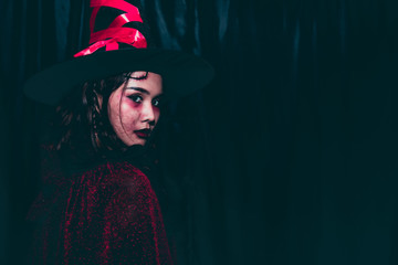 Portrait of Asian woman zombie wear hat in halloween festive makeup