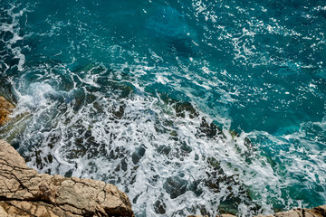 dark blue sea and rocks