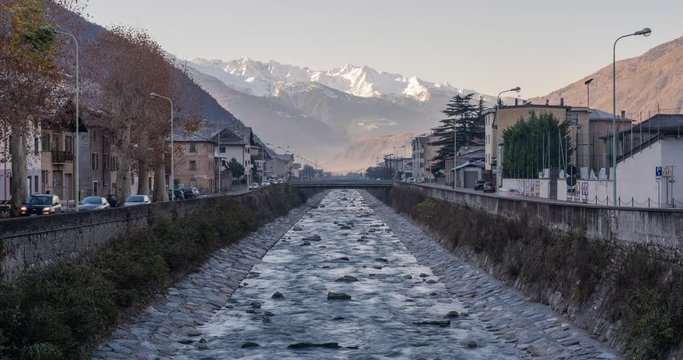 Timelapse of Adda river in the city of Tirano in Valtellina near Sondrio