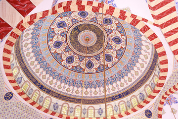Colorful dome of Turkish mosque with islamic calligraphy art