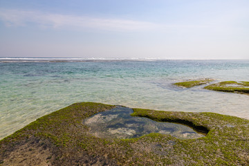 Waves and rocks on Melasti Beach. Ungasan, South Kuta, Badung Regency, Bali