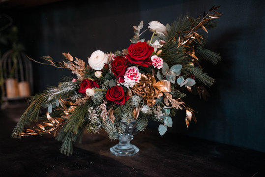 bouquet of red roses. Bouquet of natural fresh roses, tulips, anemones, peonies, buttercups, matiola, daffodil, cloves, eucalyptus. Bouquet of flowers decorated with a composition of flowers