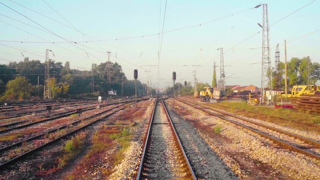 VIew over railraods in an industrial area of Bulgaria during golden hour