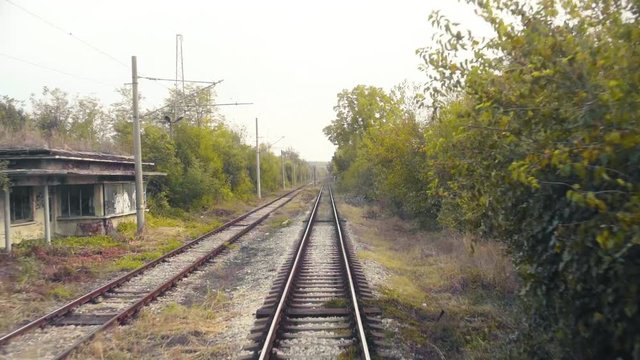 View over old railroad tracks and abandoned buildings in Bulgaria