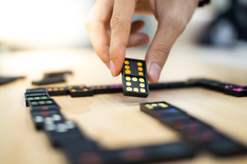 Fototapeta premium hand with domino