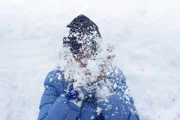 Girl with snow on her face