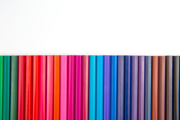 Colored pencils for drawing. Texture and background. Education and creativity. Leisure and art