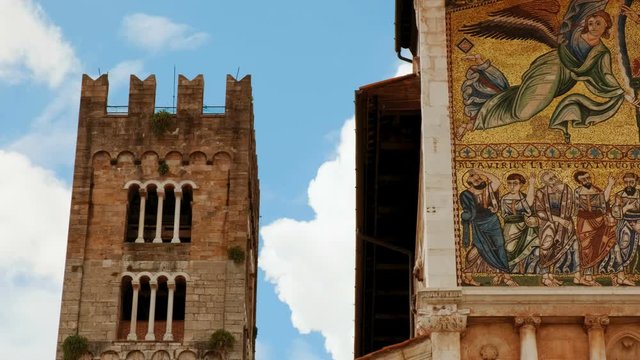 Close-up shot of the stunning San Frediano Basilica in Lucca, Tuscany, Italy, dating from 1112 with a monumental golden facade