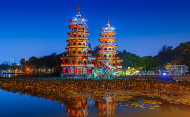 Kaohsiung, the Taiwanese dragon and the tiger pagoda at the lotus pond and the reflections at night.