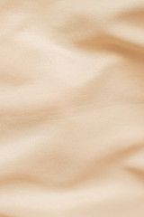 creased creamy material texture or background