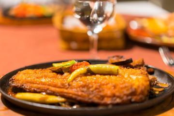 Fish dish in a restaurant. close-up. selected focus
