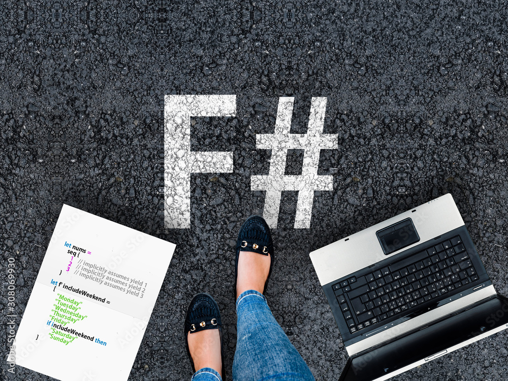 Poster f sharp programming language. a woman steps to a laptop and f# on asphalt.