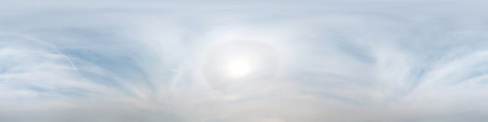 clear blue sky with halo sun. Seamless hdri panorama 360 degrees angle view with zenith for use in...