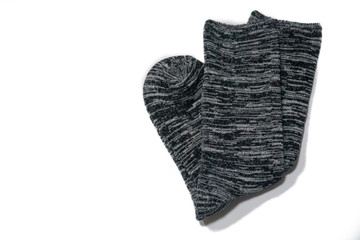 Pair of gray and black socks isolated white background