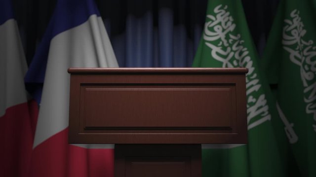 Flags of Saudi Arabia and France at international meeting, 3D animation