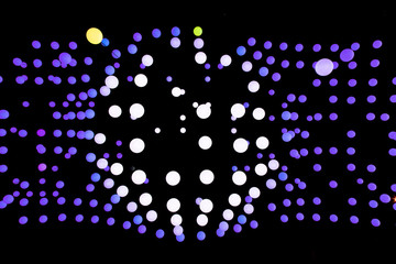 Dark purple balls on a black background, the central part of the picture is sold with white balls....