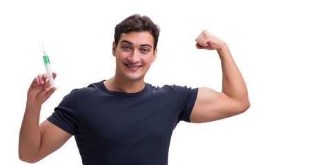 Young man in doping concept isolated on white
