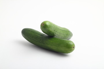 Isolated cucumber. One whole cucumber isolated on white background, clipping path
