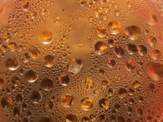 Water droplets under a clear plastic lid - Closeup Which is caused by condensation of hot steam