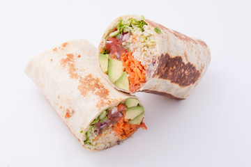Burrito with avocado slices, bean paste, mexican rice, salsa, green salad, grated carrots