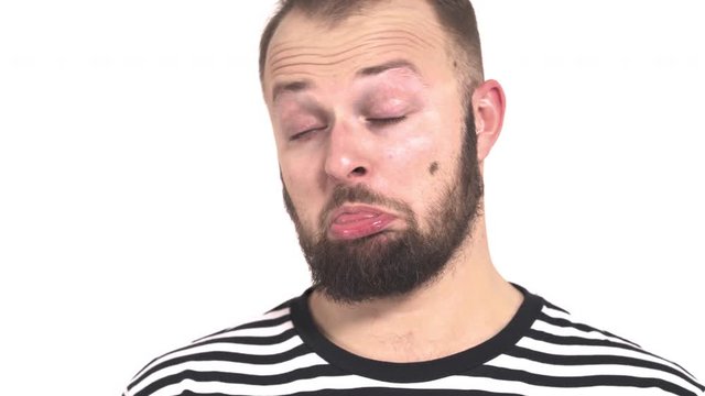 Close-up portrait of a young man. Body language and gestures concept. Hipster guy is disgusted.