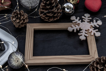 Christmas decoration with Empty wooden frame for work about design element.  Selective focus.