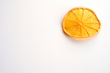 one dry orange slices on white background