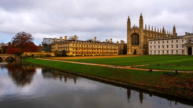 Cambridge, UK. View of Cambridge University with King College Chapel in Cambridge, England, UK during the cloudy autumn day. Time-lapse with boats in the river