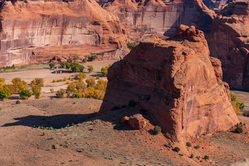 Landscape of red cliffs and valley at Canyon de Chelly National Monument in Arizona