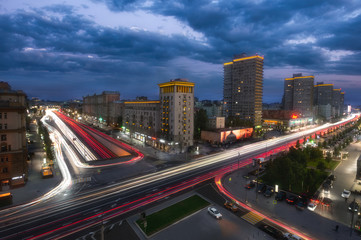 Fototapeta na wymiar Buildings at New Arbat Street after sunset. New Arbat is located in the central part of Moscow